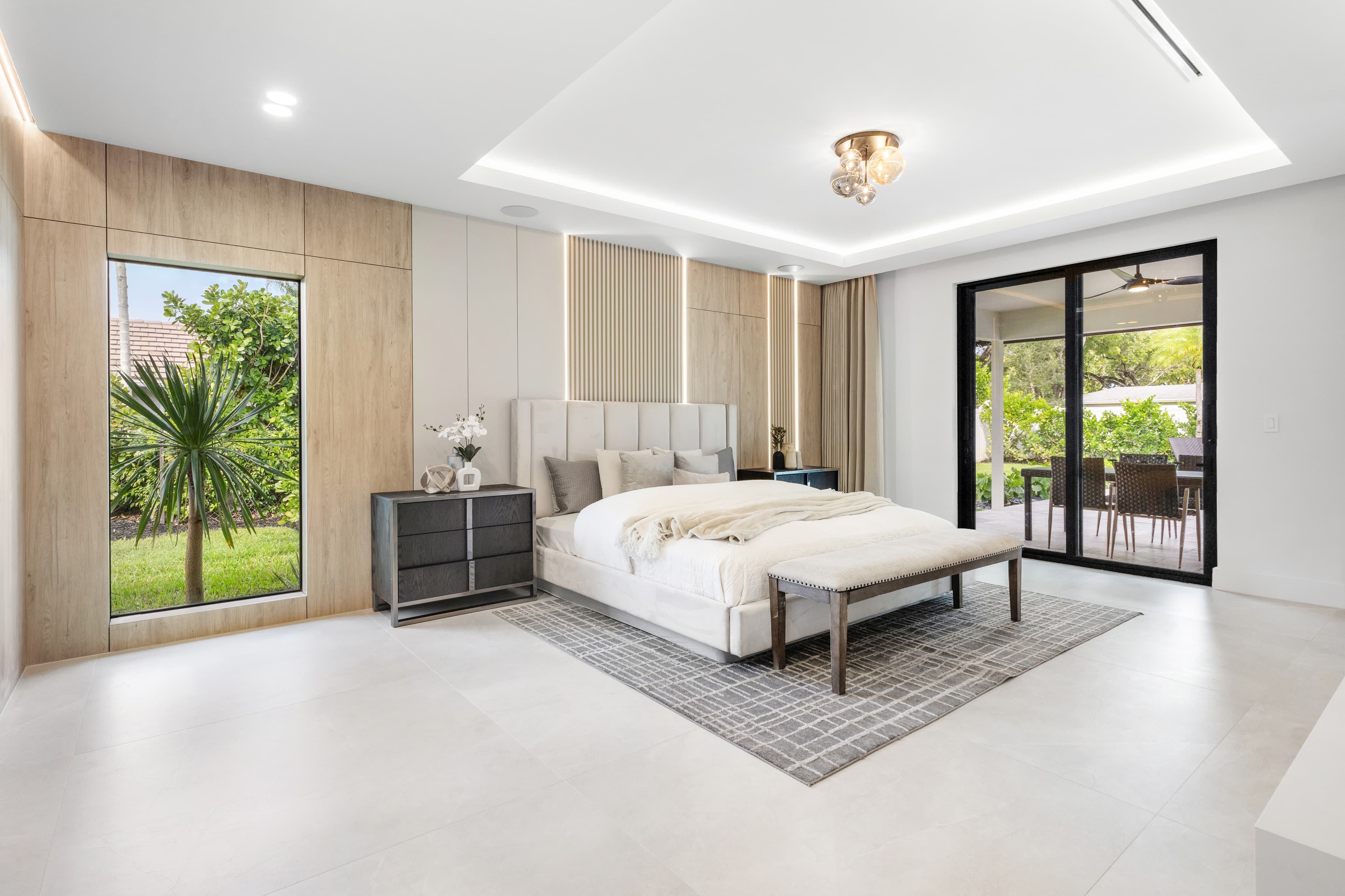 Master bedroom with impact picture window and sliding glass door