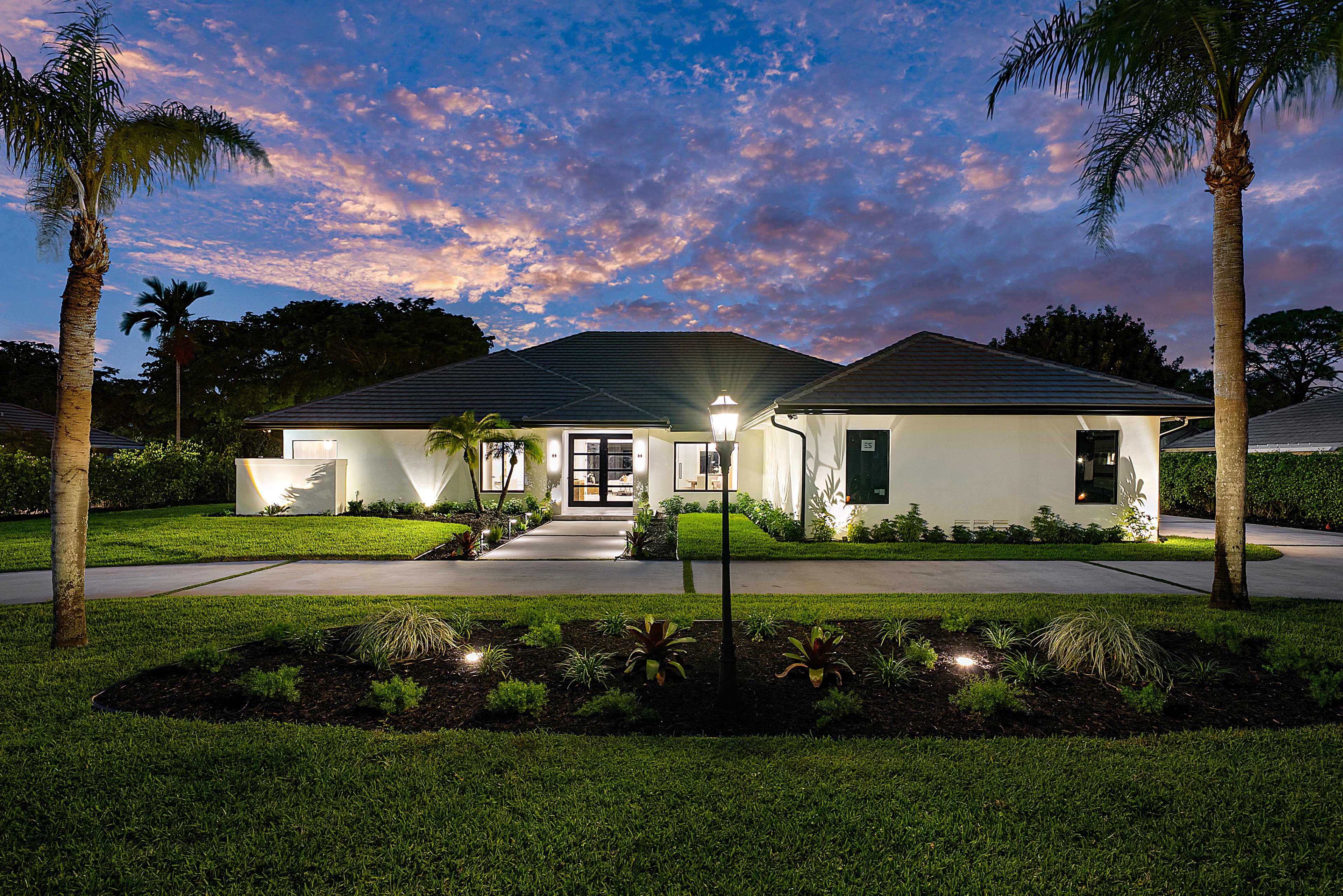 South Florida estate with impact windows at sunset